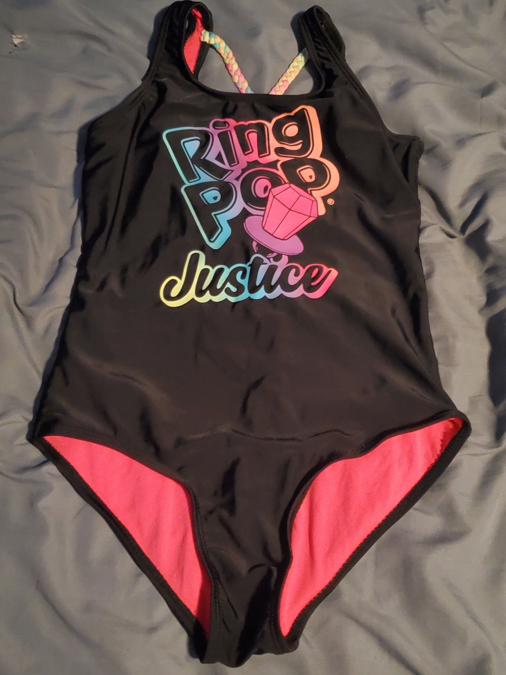 Justice Black One-Piece Swimsuit with Rainbow Ring Pop Graphic